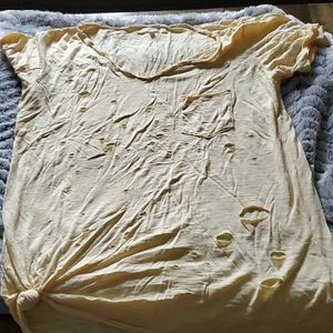 Yellow t-shirt destruction